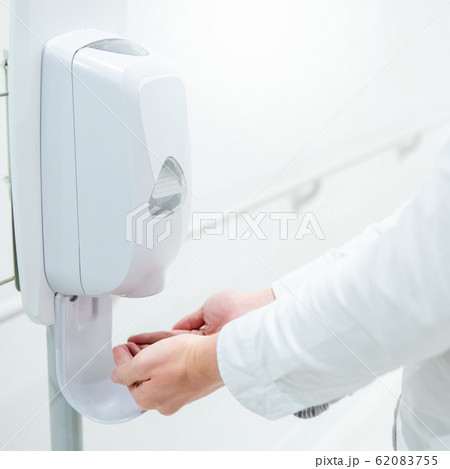 Automatic alcohol dispenser in hospital 62083755