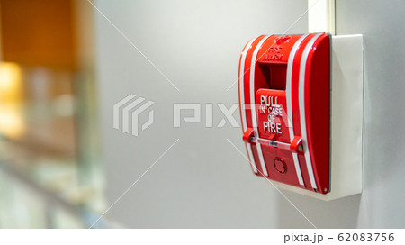 Fire alarm switch on the wall Fire alarm switch on the wall 62083756