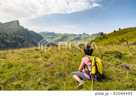 hiker woman resting in the mountain hiker woman resting in the mountain 62084495