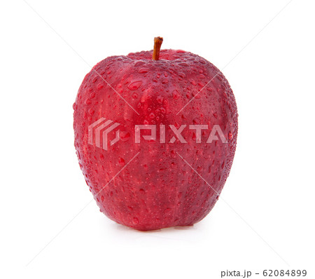 Red apple with water drops isolated on white Red apple with water drops isolated on white 62084899