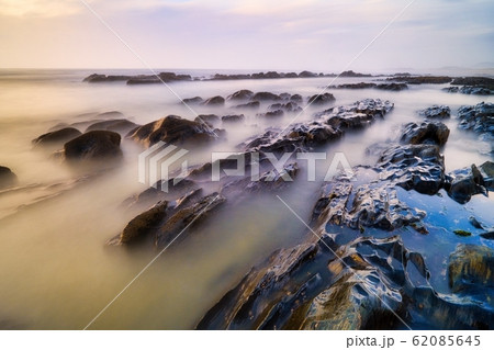 Dreamy Seascape In Portugal With Sea And Waves At Sunset Dreamy Seascape In Portugal With Sea And Waves At Sunset 62085645