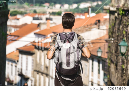 Male Pilgrim Walking Around Santiago De Compostela In Spain 62085649