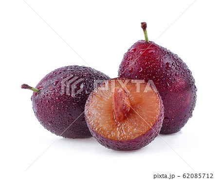 prune or plum with drop of water isolated on white prune or plum with drop of water isolated on white 62085712