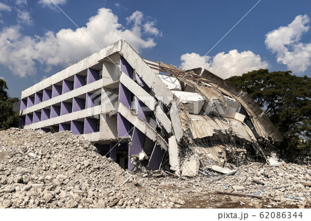 Debris and destroyed building that collapsed from the earthquake. Debris and destroyed building that collapsed from the earthquake. 62086344