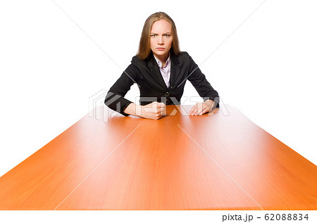 Female employee sitting at long table isolated on white 62088834