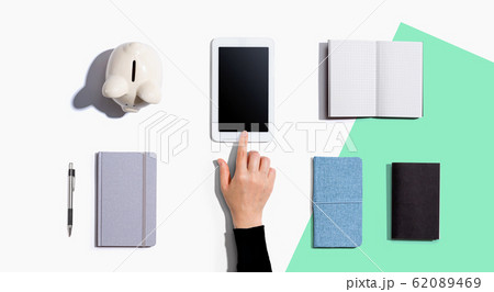 Person using a tablet computer Person using a tablet computer 62089469