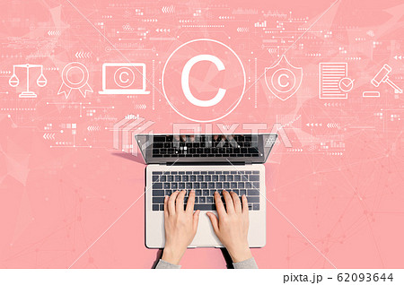 Copyright concept with person using laptop 62093644