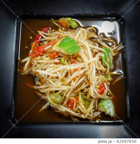 Hot and spicy thai food green papaya salad on 62097650