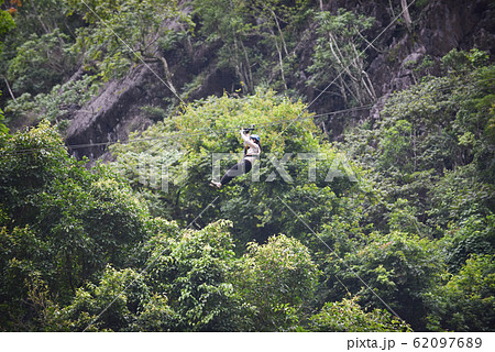 Zipline exciting sport adventure activity hanging Zipline exciting sport adventure activity hanging 62097689