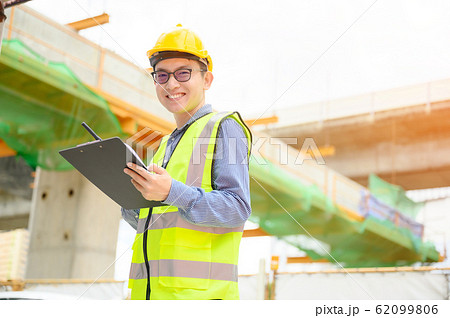 Young asian engineers are working on the construction site Young asian engineers are working on the construction site 62099806