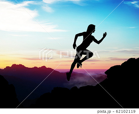 Black silhouette of woman jumps up on the rock. Black silhouette of woman jumps up on the rock. 62102119