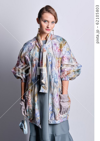 Fashion model in colorful pastel zipper coat 62105803