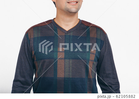 the concept of advertising clothes, fashion show-men's hoodies, shirts on a white background. Ornament and colors, decorative elements: stripes, locks, patches. Copy space 62105882
