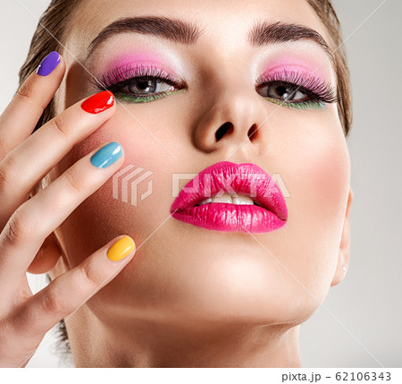 Beautiful fashion woman with a colored nails. 62106343
