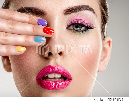 Beautiful fashion woman with a colored nails. 62106344