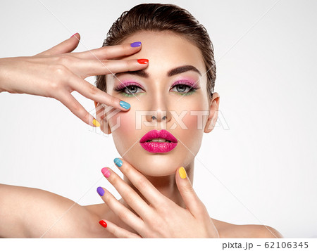 Beautiful fashion woman with a colored nails. 62106345
