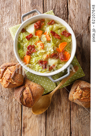 Fresh hot savoy cabbage soup with vegetables and Fresh hot savoy cabbage soup with vegetables and 62107648
