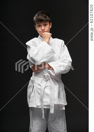 portrait of a teenager dressed in martial arts portrait of a teenager dressed in martial arts 62107820
