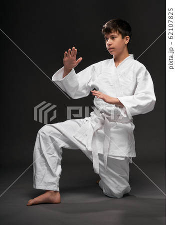 portrait of a teenager dressed in martial arts portrait of a teenager dressed in martial arts 62107825