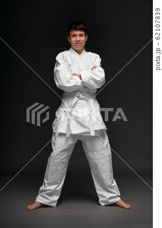 portrait of a teenager dressed in martial arts 62107839