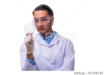 Young male chemist isolated on white 62108785