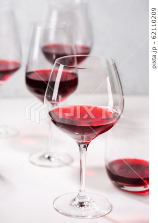 Red wine in different glasses 62110209