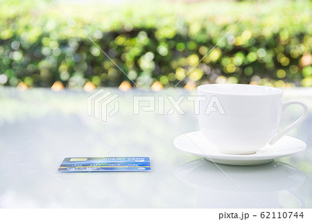 Coffee cup on table at home Coffee cup on table at home 62110744