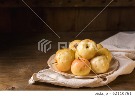 Fermented apples on a plate Fermented apples on a plate 62110761