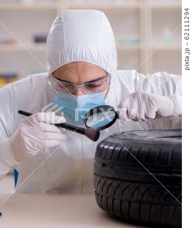 Expert is looking at car accident evidence 62111294