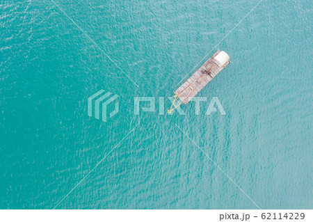fishing boat over lake in aerial view fishing boat over lake in aerial view 62114229