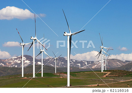 Wind farm at sun spring day Wind farm at sun spring day 62116016