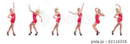 Woman dancing in red dress isolated on white 62116358