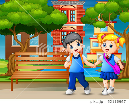 Happy school children walking pass through in park 62116967