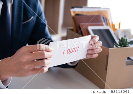 Businessman holding with I quit words card letter, Businessman holding with I quit words card letter, 62118041