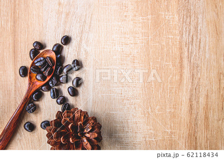 Roasted coffee beans in brown sacks Roasted coffee beans in brown sacks 62118434