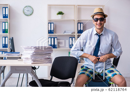 Young employee escaping for summer vacation Young employee escaping for summer vacation 62118764