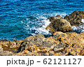 View on Rock on Nisyros island covered by orange 62121127