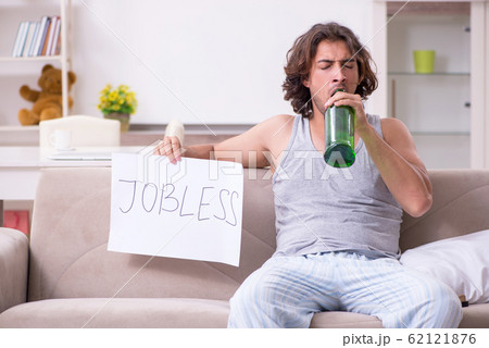 Unemployed man desperate at home 62121876
