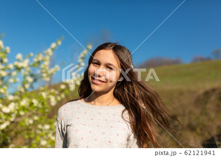 Portrait of a young beautiful teenager girl in a 62121941
