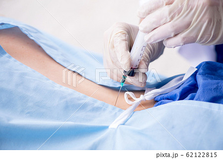 Female patient getting an injection in the clinic Female patient getting an injection in the clinic 62122815