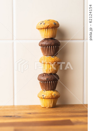 Sweet muffins. Chocolate cupcakes. 62124154