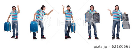 Young man travelling with suitcases isolated on white Young man travelling with suitcases isolated on white 62130665