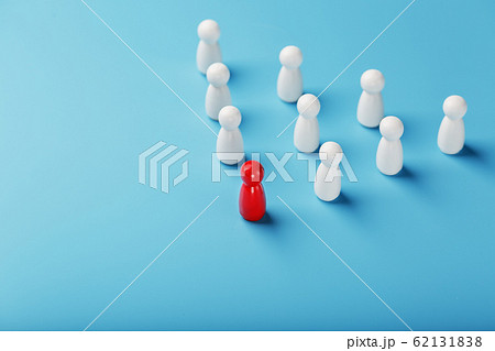 The leader in red leads a group of white employees The leader in red leads a group of white employees 62131838