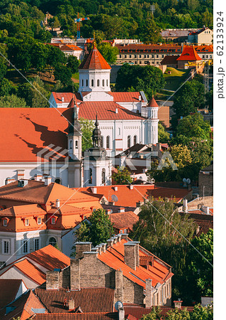 Vilnius, Lithuania. View Of Cathedral Of Theotokos And Church Of St. Johns, St. John Baptist And St. John Apostle And Evangelist In Summer Day Vilnius, Lithuania. View Of Cathedral Of Theotokos And Church Of St. Johns, St. John Baptist And St. John Apostle And Evangelist In Summer Day 62133924
