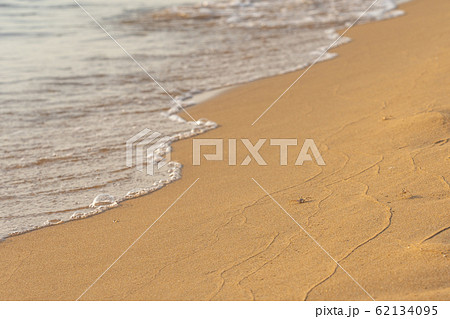 Tiny crab on the sand at peaceful beach 62134095