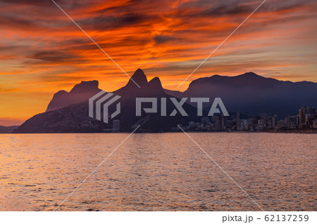 Sunset on the ocean at Rio de Janeiro, Ipanema beach. Brazil 62137259