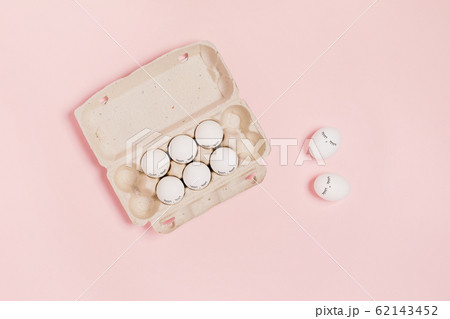 Eggs on a pink background. Eggs on a pink background. 62143452