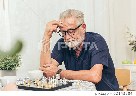 elder stress seriously thinking while playing chess board game elder stress seriously thinking while playing chess board game 62143504