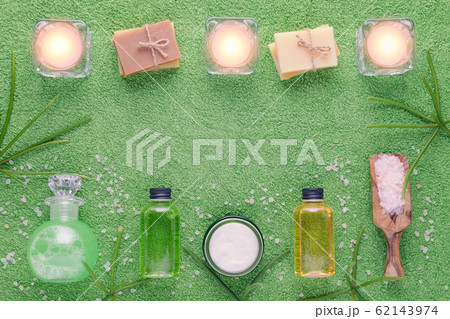 natural products for spa with candles, background with copy space natural products for spa with candles, background with copy space 62143974