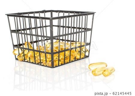 Golden fish oil isolated on white Golden fish oil isolated on white 62145445